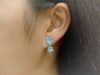 Sterling Silver Synthetic Blue Opal Double Plumeria Dangle Earrings