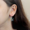Sterling Silver Synthetic Blue Opal Open Plumeria Dangle Earrings